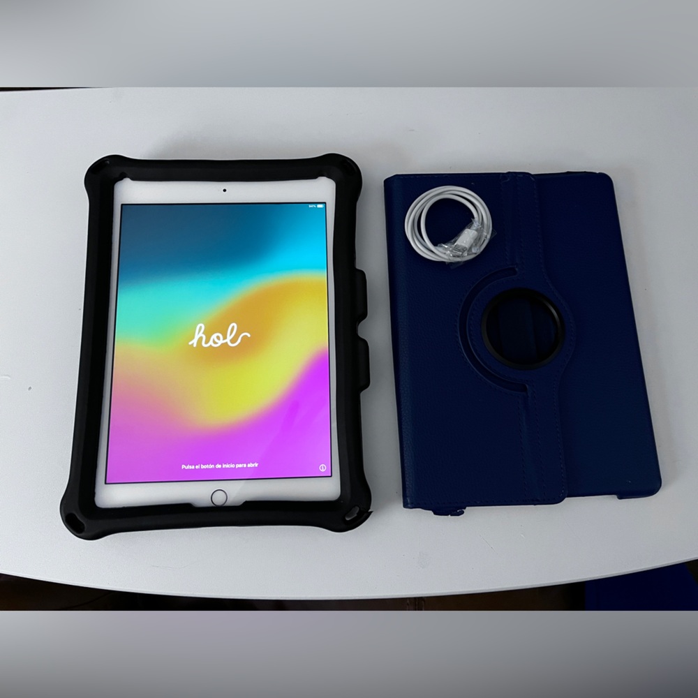 Apple iPad 2 in Champaign with Black Rugged Sleeve and Navy Blue Rotating Folio.